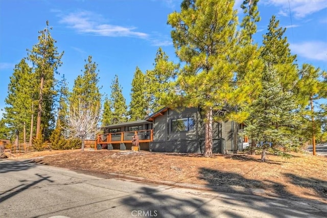 view of front of property featuring a deck