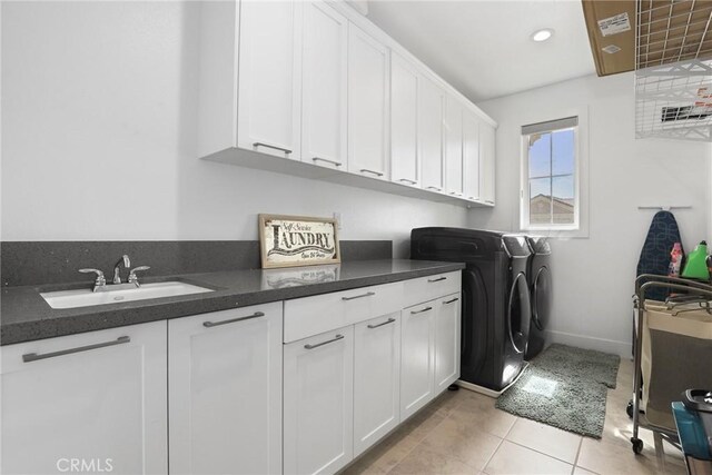 20535 W Bluebird Ct, Porter Ranch, CA 91326 - clothes washing area with independent washer and dryer, cabinet space, light tile patterned floors, and recessed lighting