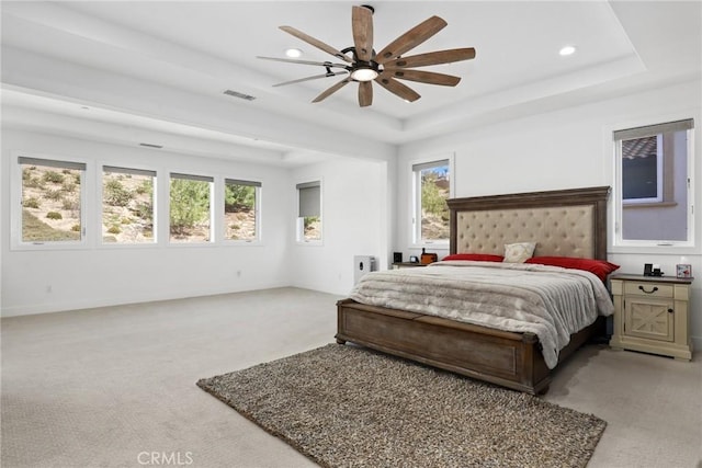 20535 W Bluebird Ct, Porter Ranch, CA 91326 - bedroom with light colored carpet, a tray ceiling, recessed lighting, and ceiling fan