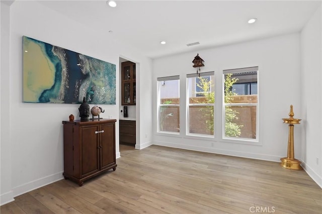 20535 W Bluebird Ct, Porter Ranch, CA 91326 - living room with light wood-type flooring, recessed lighting, and baseboards