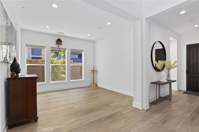 20535 W Bluebird Ct, Porter Ranch, CA 91326 - foyer entrance featuring light wood-style flooring, recessed lighting, and baseboards
