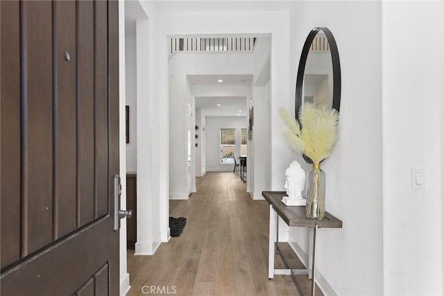 20535 W Bluebird Ct, Porter Ranch, CA 91326 - corridor featuring baseboards, recessed lighting, and light wood-style flooring