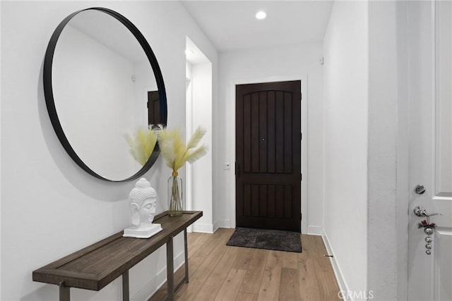 20535 W Bluebird Ct, Porter Ranch, CA 91326 - foyer with light wood-style floors, recessed lighting, and baseboards