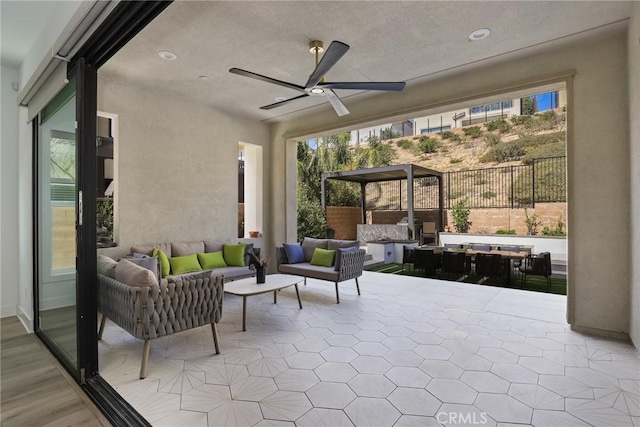 20535 W Bluebird Ct, Porter Ranch, CA 91326 - view of patio featuring outdoor lounge area, ceiling fan, and fence