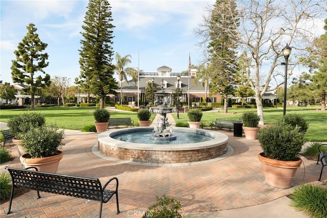 view of home's community featuring a lawn