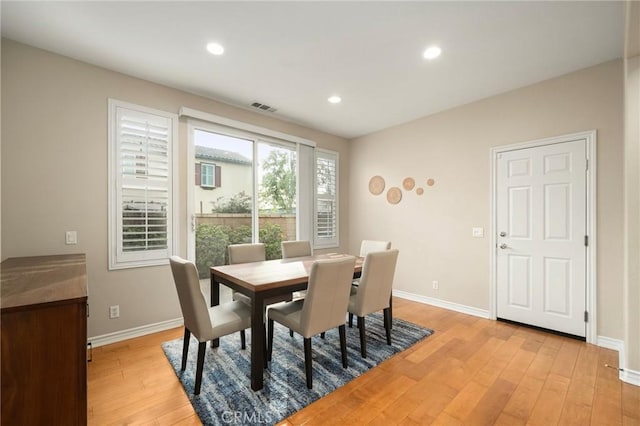 dining room featuring visible vents, recessed lighting, baseboards, and light wood-style floors