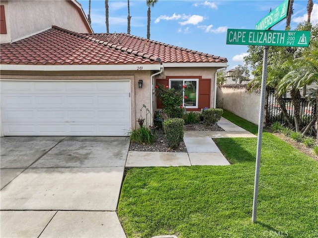 view of front of house featuring fence, an attached garage, stucco siding, a front lawn, and a tiled roof