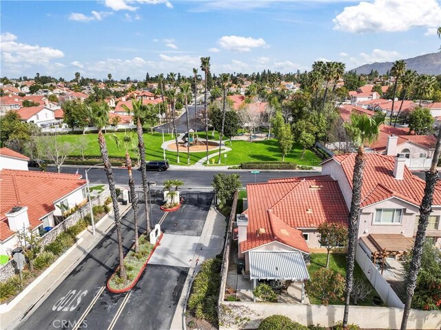 aerial view featuring a mountain view and a residential view