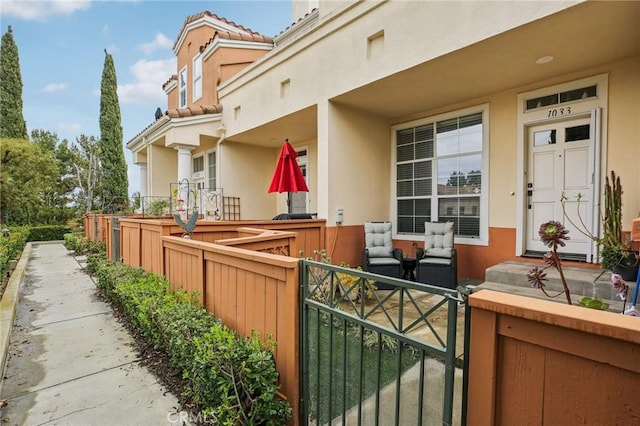 view of patio featuring fence