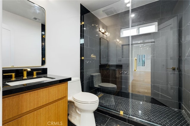 full bathroom with vanity, visible vents, a stall shower, tile patterned flooring, and toilet