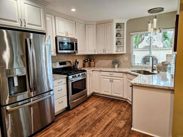 kitchen featuring dark wood-type flooring, open shelves, light stone counters, tasteful backsplash, and appliances with stainless steel finishes