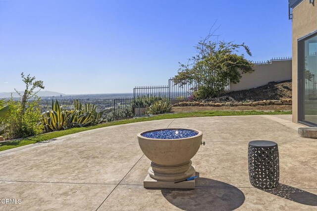 view of patio with fence