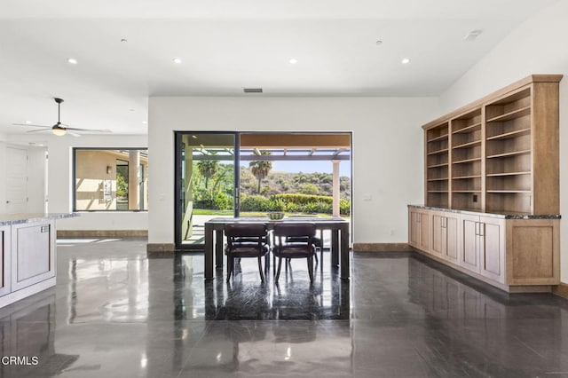 dining area with a wealth of natural light, baseboards, a ceiling fan, and recessed lighting