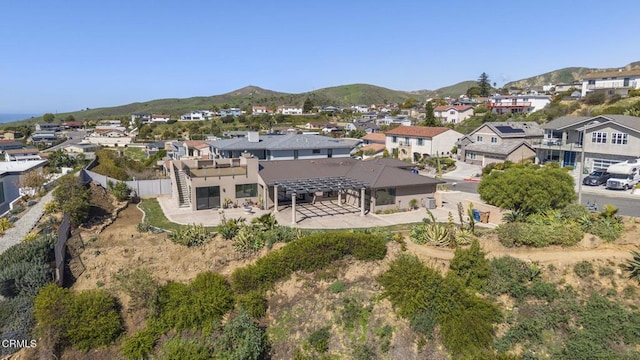 bird's eye view featuring a residential view and a mountain view