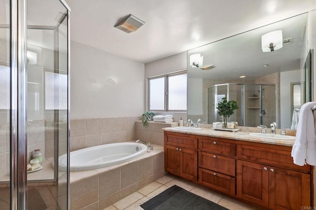 137 Jupiter St, Encinitas, CA 92024 - full bathroom with a bath, double vanity, a stall shower, and tile patterned floors