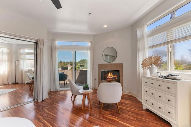 137 Jupiter St, Encinitas, CA 92024 - sitting room featuring a tile fireplace, plenty of natural light, ceiling fan, and recessed lighting