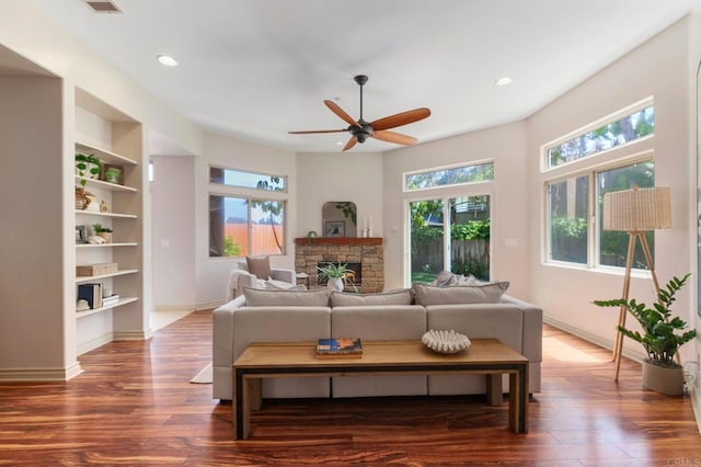 137 Jupiter St, Encinitas, CA 92024 - living room featuring wood finished floors, ceiling fan, built in features, a fireplace, and recessed lighting