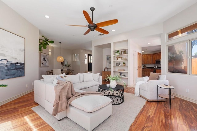 137 Jupiter St, Encinitas, CA 92024 - living area with healthy amount of natural light, light wood finished floors, a ceiling fan, and recessed lighting