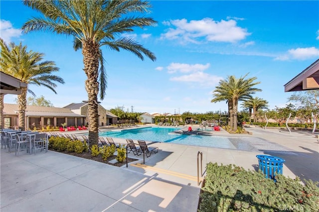 community pool with a patio