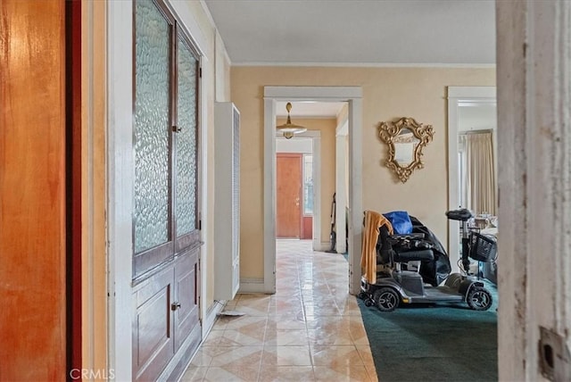 hallway featuring ornamental molding