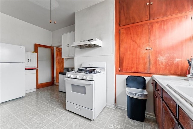 kitchen with under cabinet range hood, white appliances, and baseboards