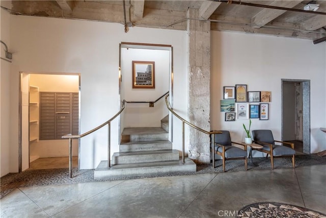 stairway with finished concrete floors