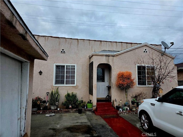 view of front of home with stucco siding