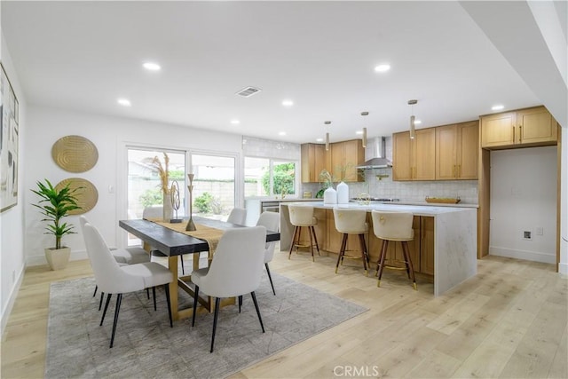 dining area with recessed lighting, visible vents, light wood finished floors, and baseboards