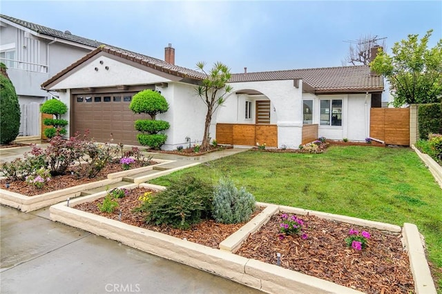 view of front of property with stucco siding, fence, a garage, a chimney, and a tiled roof