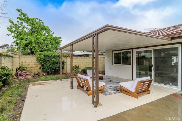 view of patio / terrace with fence