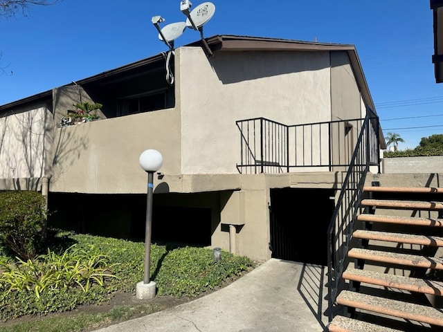 view of home's exterior with stucco siding