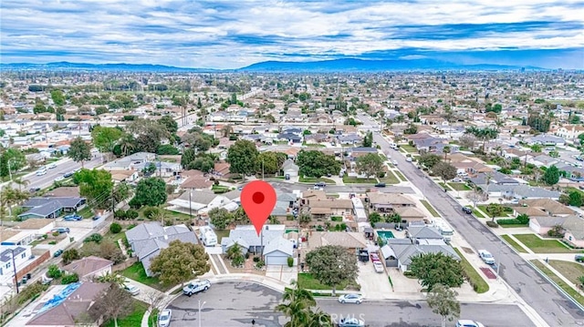 aerial view with a mountain view and a residential view