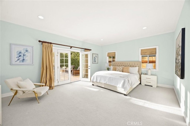 carpeted bedroom with recessed lighting, french doors, baseboards, and access to exterior