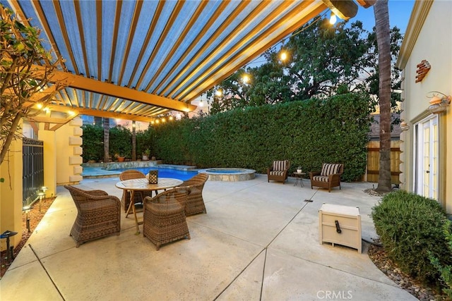 view of patio / terrace with a fenced in pool, an in ground hot tub, a pergola, and fence