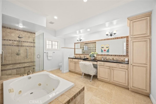 bathroom with visible vents, crown molding, toilet, a stall shower, and a sink