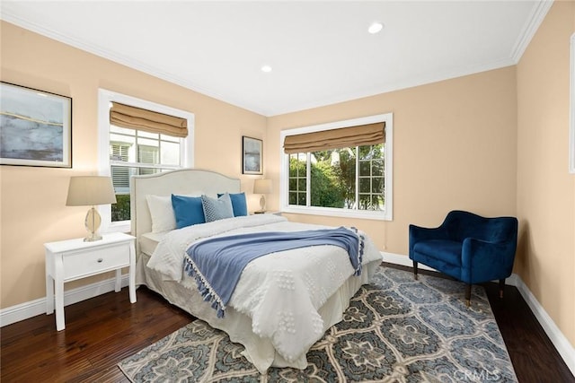 bedroom featuring recessed lighting, baseboards, wood finished floors, and crown molding