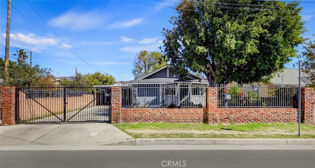 view of front facade with a gate and a fenced front yard