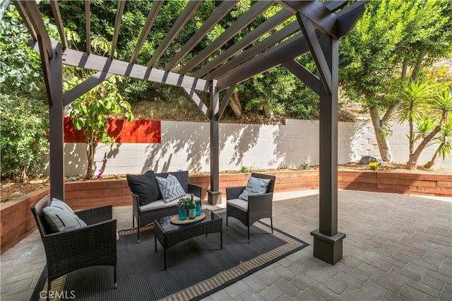 view of patio / terrace with an outdoor hangout area, a fenced backyard, and a pergola