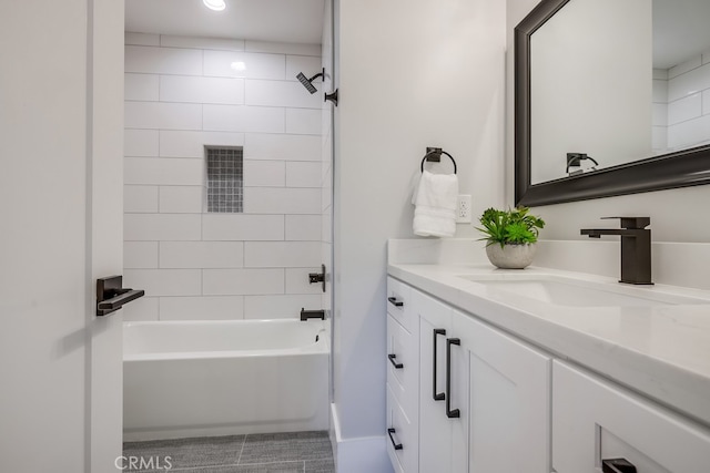 full bathroom with vanity and shower / bath combination