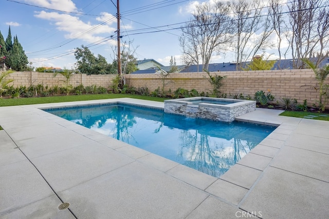 view of swimming pool with a pool with connected hot tub, a fenced backyard, and a patio area