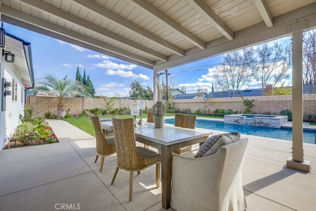 view of patio with outdoor dining space, a fenced backyard, and a pool with connected hot tub