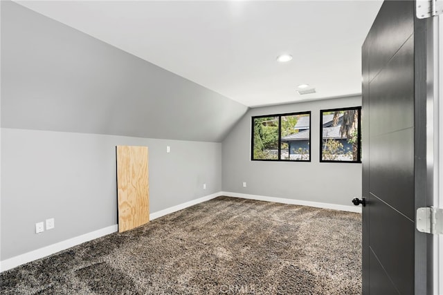 bonus room with visible vents, baseboards, vaulted ceiling, carpet floors, and recessed lighting