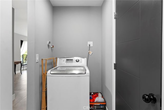 washroom featuring washer / dryer and laundry area