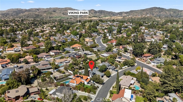 birds eye view of property featuring a residential view and a mountain view