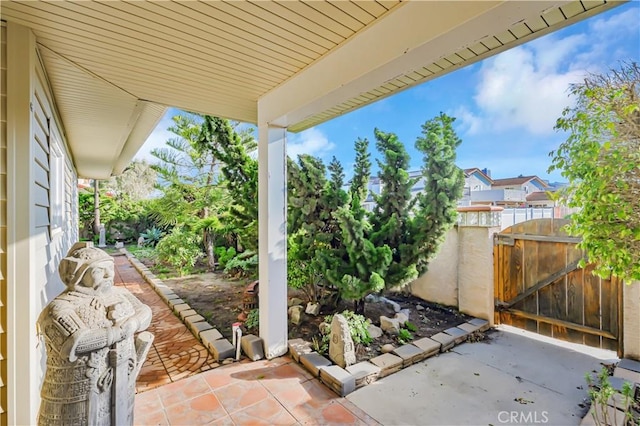 view of patio / terrace with a gate