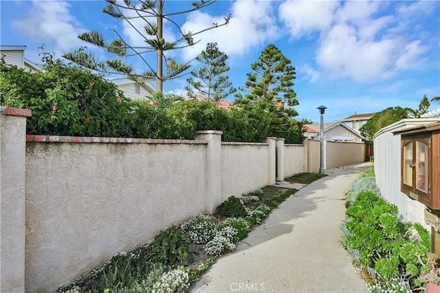 view of patio / terrace featuring fence