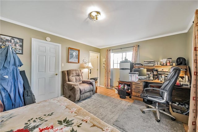 home office with crown molding and wood finished floors