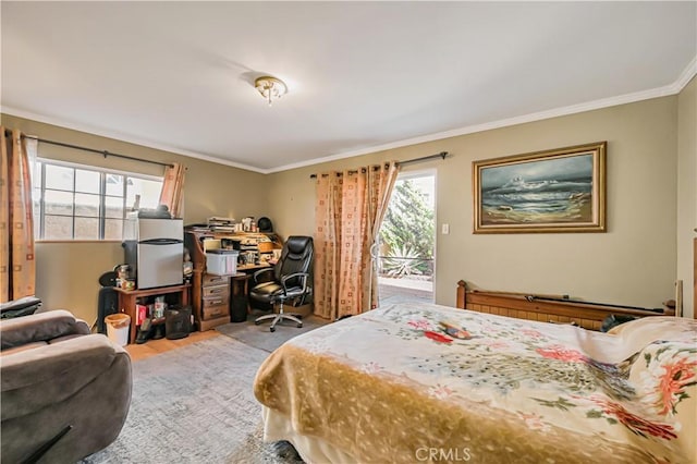 bedroom with access to outside, wood finished floors, and ornamental molding