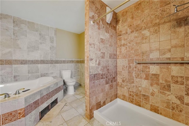 full bath featuring toilet, tile walls, a garden tub, and a stall shower