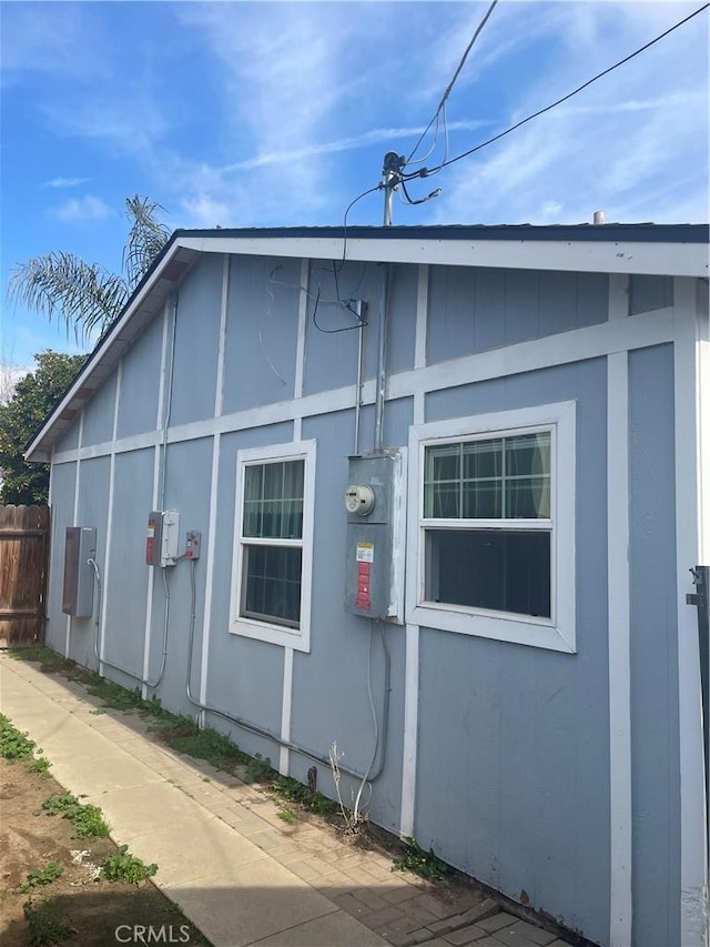view of property exterior featuring fence